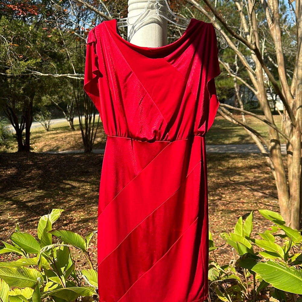 Stunning red dress! Size medium, split flutter sleeves, open back with faux bow